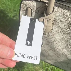 Nine West Bags Nine Wests Mushroom Logo Satchel In Cream